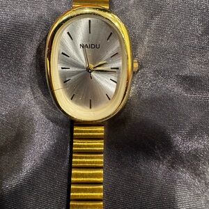 Gold and Silver Wearable Watch